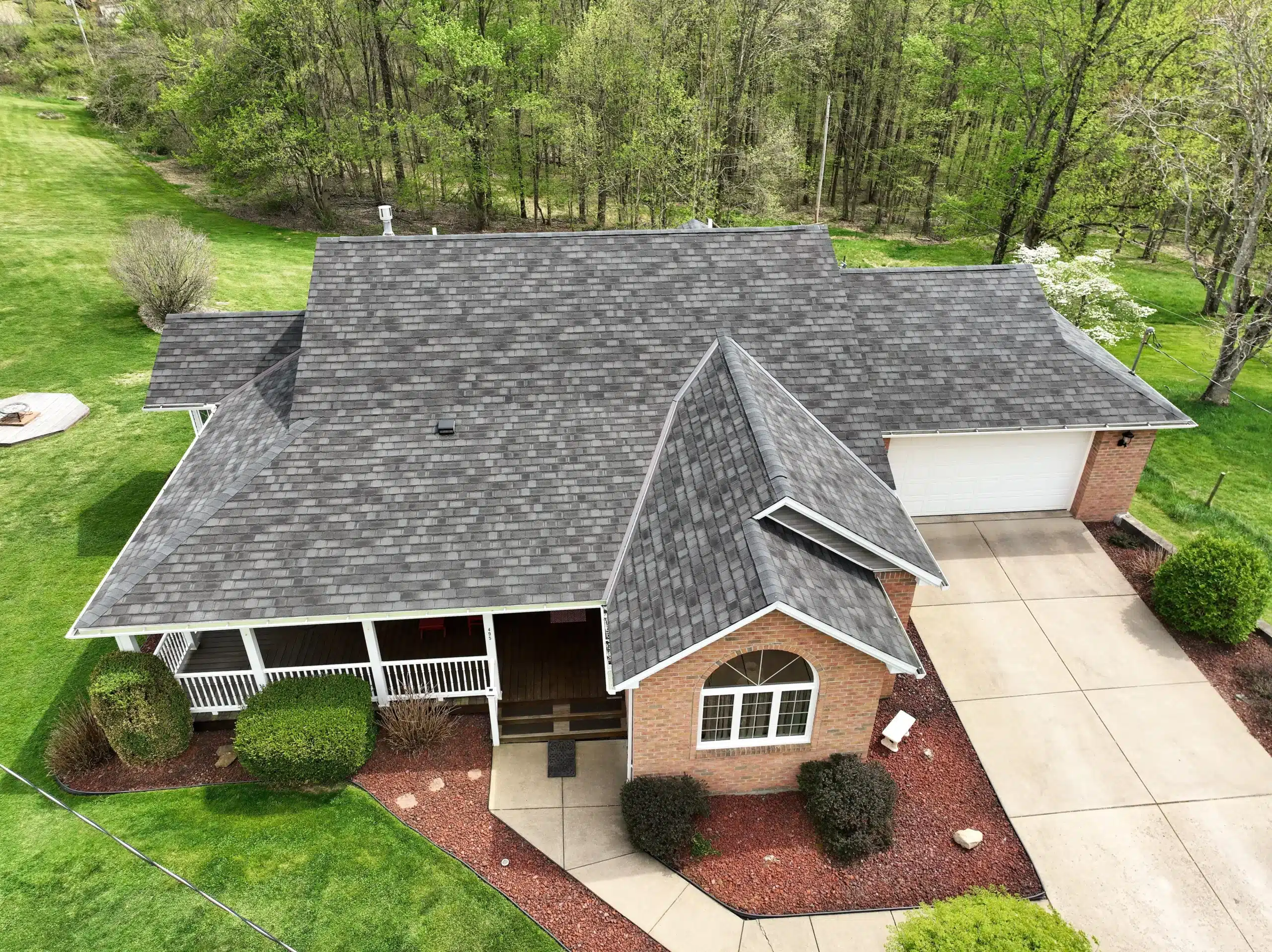 Expert roofing team assessing the best materials for Richland's climate